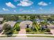 Aerial view of house and lakefront community at 24849 Pennington Ter, Venice, FL 34293