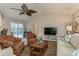 Living room with pool view and comfy seating at 612 Albee W Rd, Nokomis, FL 34275
