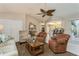 Living area with comfy seating and access to kitchen at 612 Albee W Rd, Nokomis, FL 34275