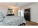 Bedroom with a queen bed, dresser, and patio access at 612 Albee W Rd, Nokomis, FL 34275