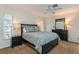 Bedroom with queen bed, nightstands, and dresser at 612 Albee W Rd, Nokomis, FL 34275