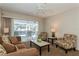 Living room with pool view and comfy seating at 612 Albee W Rd, Nokomis, FL 34275