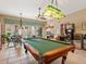 Game room featuring a pool table and arcade game at 1040 Gulf Winds Way, Nokomis, FL 34275