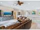 Second living area with a comfortable seating arrangement and a TV at 1040 Gulf Winds Way, Nokomis, FL 34275