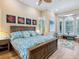 Relaxing main bedroom with ample natural light and calming decor at 1040 Gulf Winds Way, Nokomis, FL 34275