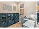 Bright office space with built-in cabinets and a workspace at 1040 Gulf Winds Way, Nokomis, FL 34275