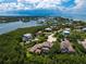 Aerial view of upscale neighborhood near the coast at 1040 Gulf Winds Way, Nokomis, FL 34275