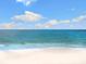 Relaxing beach with pristine white sand and calm waters at 1040 Gulf Winds Way, Nokomis, FL 34275