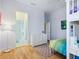 Light and bright bedroom with ensuite bathroom access at 1040 Gulf Winds Way, Nokomis, FL 34275