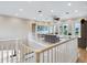 Spacious landing with hardwood floors, overlooking the living room at 1040 Gulf Winds Way, Nokomis, FL 34275