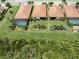 Aerial view of the home and surrounding community at 10079 Crooked Creek Dr, Venice, FL 34293