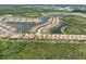 Expansive aerial view of the community and surrounding landscape at 10079 Crooked Creek Dr, Venice, FL 34293