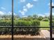 Enjoy the scenic backyard view from the screened lanai at 10079 Crooked Creek Dr, Venice, FL 34293