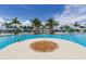 Large resort-style pool at Sarasota National with fire pit and lounge chairs at 10079 Crooked Creek Dr, Venice, FL 34293