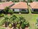 Aerial view showing the home's backyard and landscaping at 10079 Crooked Creek Dr, Venice, FL 34293