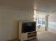 The living room features a TV and is adjacent to the dining area at 209 Roma Rd, Venice, FL 34285