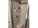 Clean, tiled shower with built-in niche and modern fixtures at 209 Roma Rd, Venice, FL 34285