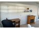 Bright sunroom with shelving and an electric fireplace, great for relaxing or a home office at 209 Roma Rd, Venice, FL 34285