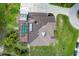 An aerial view of a property with a spacious backyard, swimming pool, and meticulous landscaping at 2091 Marlin Way, Englewood, FL 34224