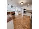 Well-appointed kitchen featuring modern appliances, white cabinets, and granite countertops at 2091 Marlin Way, Englewood, FL 34224