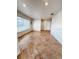Spacious living room featuring beautiful tile flooring, large windows, and recessed lighting at 2091 Marlin Way, Englewood, FL 34224