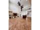 Large living room featuring a fireplace, built-in shelving, unique flooring and high ceiling at 2091 Marlin Way, Englewood, FL 34224