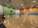 Indoor pickleball court with wood flooring and ample space for games at 1985 W Palms Dr, Port Charlotte, FL 33953