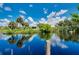 Scenic view of canal with lush vegetation and home reflection at 9027 E River Rd, Venice, FL 34293