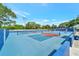 Well maintained pickleball courts with blue surface at 227 Southampton Dr # 289, Venice, FL 34293