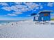 Lifeguard stand and beachgoers enjoying a sunny day at 3485 Roslyn Rd, Venice, FL 34293