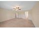 Bright bedroom with tile floors and ceiling fan at 5742 Janus Ave, North Port, FL 34288