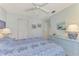 Bedroom with double bed, dresser, and closet at 803 Harrington Lake N Dr # 75, Venice, FL 34293