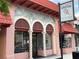 Venice Avenue Creamery storefront, a charming building with pink facade and arched entry at 803 Harrington Lake N Dr # 75, Venice, FL 34293