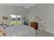 Spacious bedroom with water views and ample natural light at 803 Harrington Lake N Dr # 75, Venice, FL 34293