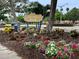 Centennial Park entrance with manicured landscaping and signage at 803 Harrington Lake N Dr # 75, Venice, FL 34293