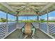 Screened gazebo with lake view, perfect for relaxing at 803 Harrington Lake N Dr # 75, Venice, FL 34293