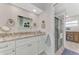 Elegant bathroom with granite vanity, a walk-in shower, and updated fixtures at 803 Harrington Lake N Dr # 75, Venice, FL 34293