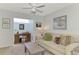 Cozy sitting area with sofa and built-in workspace at 803 Harrington Lake N Dr # 75, Venice, FL 34293