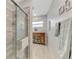 Updated bathroom with a walk-in shower and stylish tile at 803 Harrington Lake N Dr # 75, Venice, FL 34293