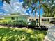 Attractive single-story home with manicured lawn and landscaping at 1895 Buccaneer Cir, Sarasota, FL 34231