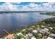 Aerial view of waterfront homes and neighborhood at 4090 Pelican Shores Cir, Englewood, FL 34223