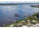 Aerial view showing the property and its proximity to the dock entrance at 4090 Pelican Shores Cir, Englewood, FL 34223