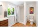 Clean bathroom with stand up shower and toilet at 4090 Pelican Shores Cir, Englewood, FL 34223