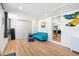Small bedroom with a comfortable sofa and built-in storage at 4090 Pelican Shores Cir, Englewood, FL 34223