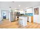 Modern kitchen with stainless steel appliances and butcher block countertops at 4090 Pelican Shores Cir, Englewood, FL 34223