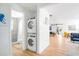 Stackable washer and dryer in a convenient hallway location at 4090 Pelican Shores Cir, Englewood, FL 34223
