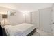 Cozy basement bedroom with a window and ensuite at 6 Cove Ln, Englewood, FL 34223