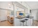 Kitchen features a breakfast bar and granite countertops at 6 Cove Ln, Englewood, FL 34223