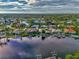 Wide aerial view of waterfront community at 703 Portia N St, Nokomis, FL 34275