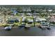 Aerial view of waterfront home and neighborhood at 703 Portia N St, Nokomis, FL 34275